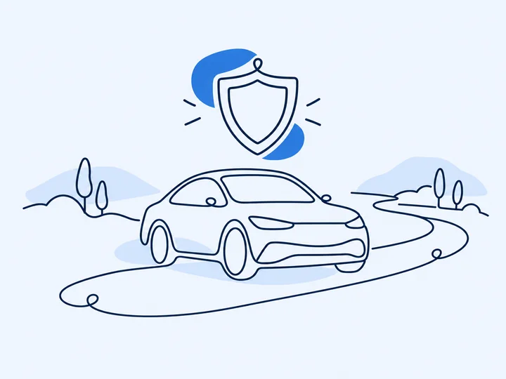 Car on a road under a shield